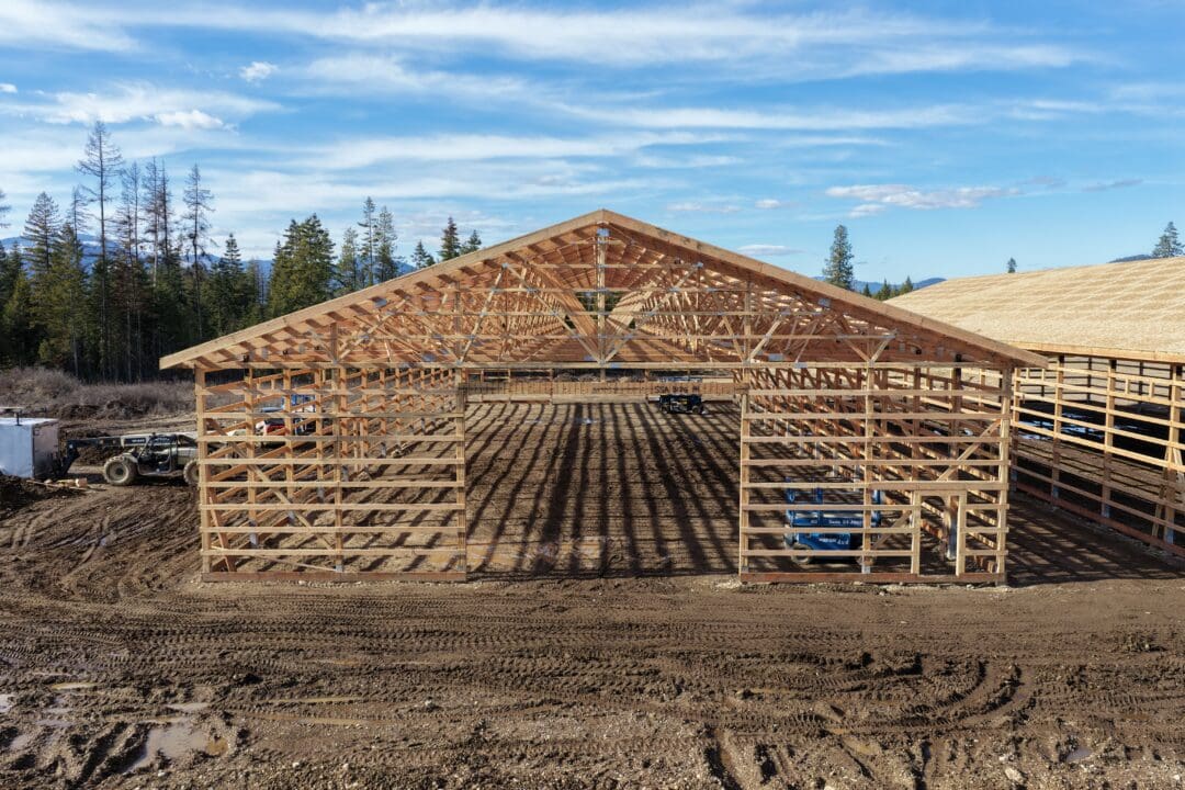 A pole barn being built by Steel Structures America. The pictured building is halfway through construction.