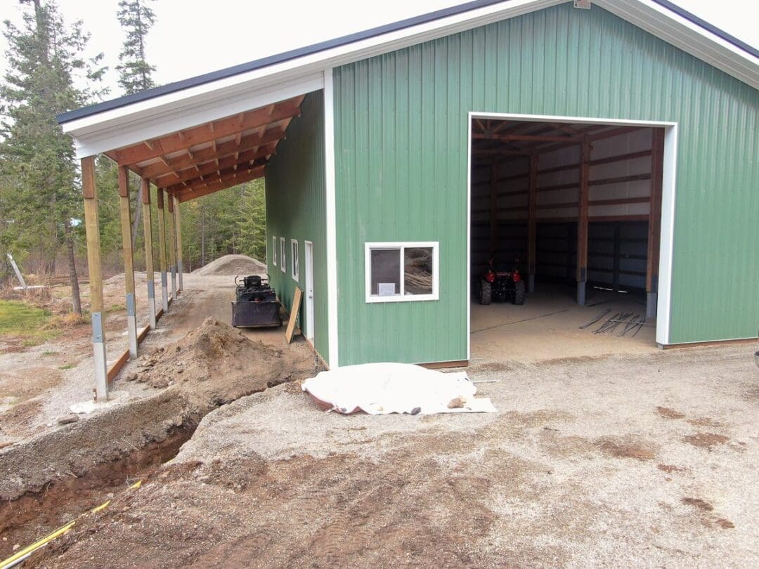 #10943 – 30x50x16 w/ (1) lean-to & (1) shed – Hayden, Idaho | Steel Structures America