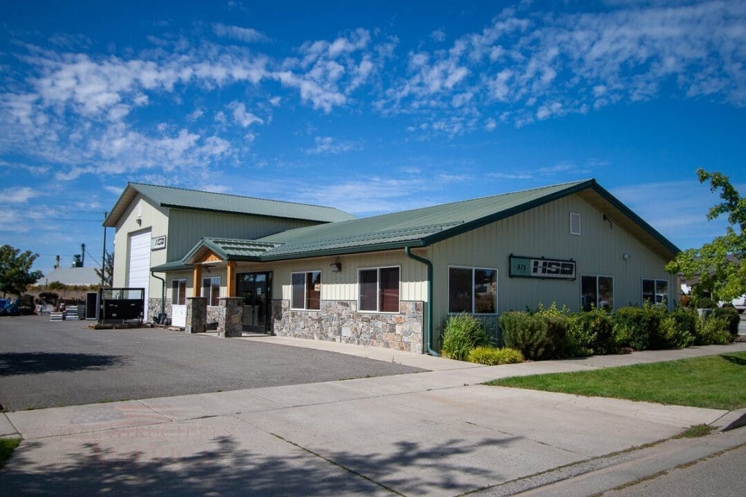 HSD corp polebuilding with rockwall | Steel Structures America