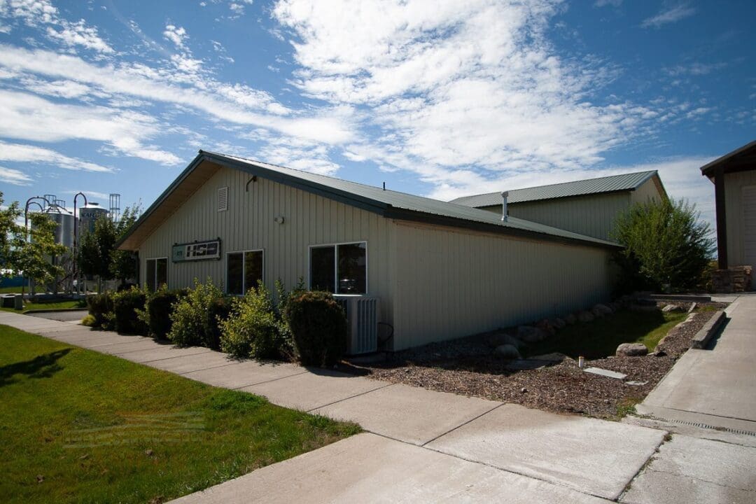 HSD corp polebuilding with rockwall | Steel Structures America