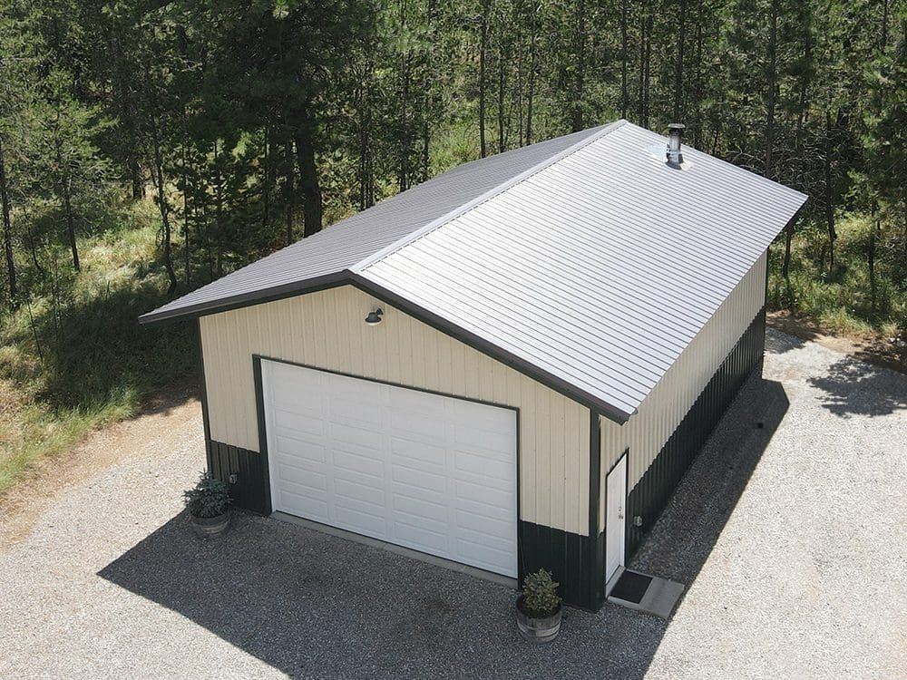 beige and brown garage with white overhead garage door