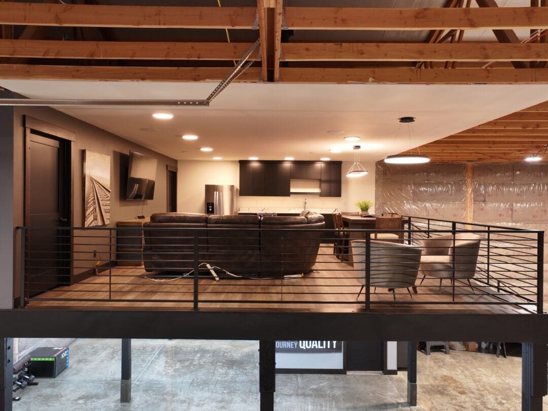 A living area above a shop in a metal building workshop