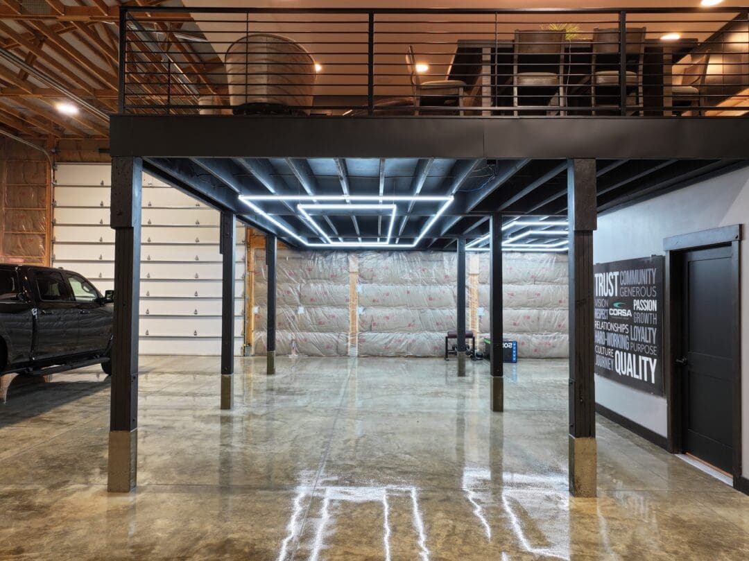 A multi-use pole barn makes the most of its square footage by putting a living area in a loft