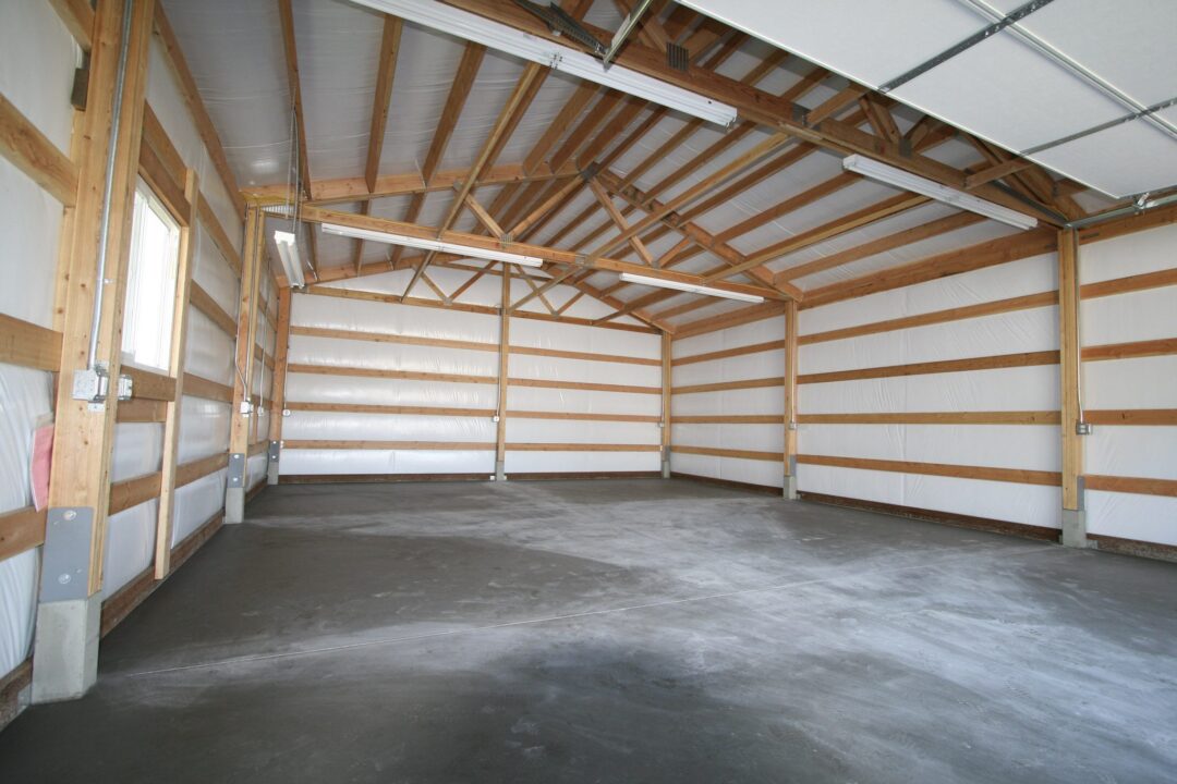 Inside of a pole barn building with Vinyl Backed Fiberglass Roof and Wall Insulation