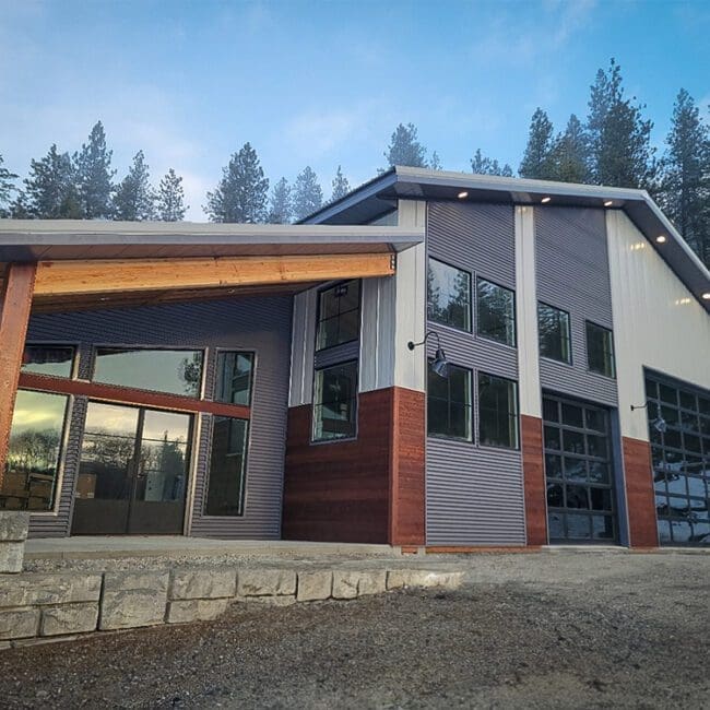 modern steel structure building with soffit and wood accents