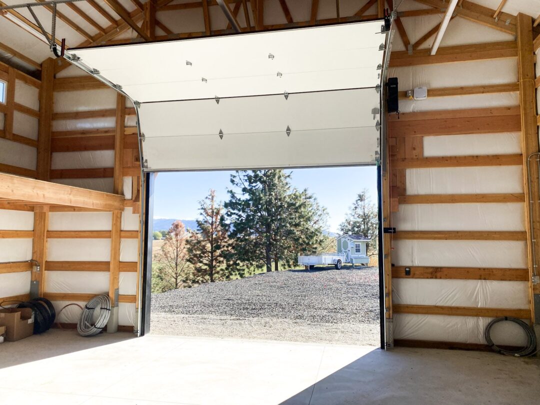 Open garage door inside of s steel structure building