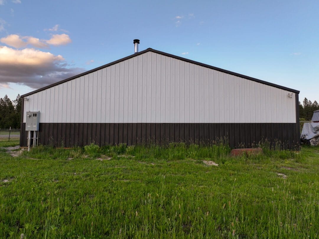 Enclosed lean-to addition on residential pole building in Hayden, Idaho
