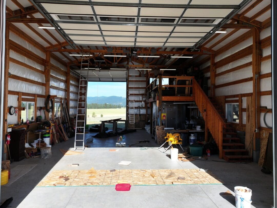Inside of 30×48×16 Post-Frame Shop with Dual Lean-Tos in Chattaroy WA