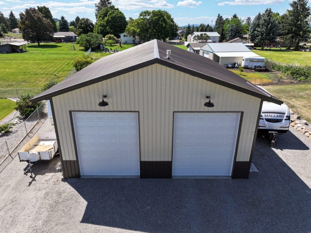 Ridge vent and vented soffits on steel shop for ventilation (12586)