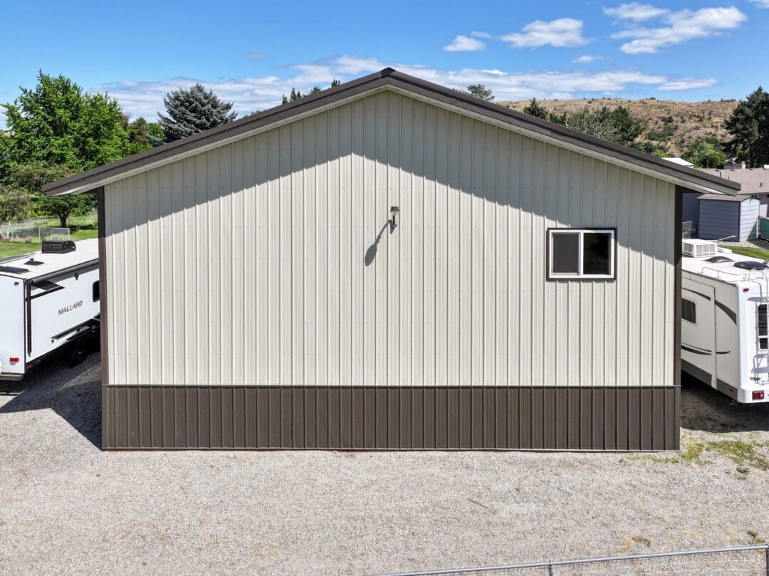 Exterior 36x48 steel shop with standard gable roof and 16-ft eaves (12586)