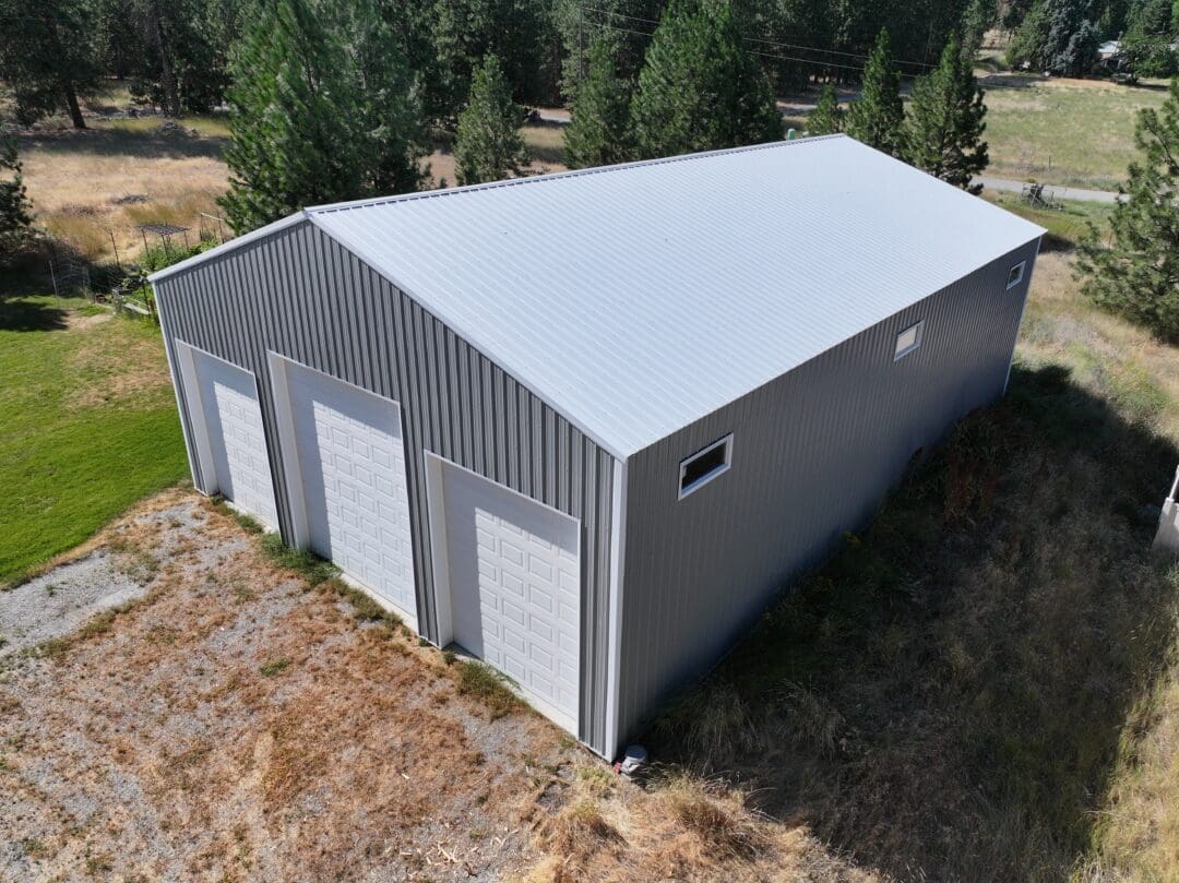 Side profile of 40×60 residential pole building with Polar White roof in Greenacres WA