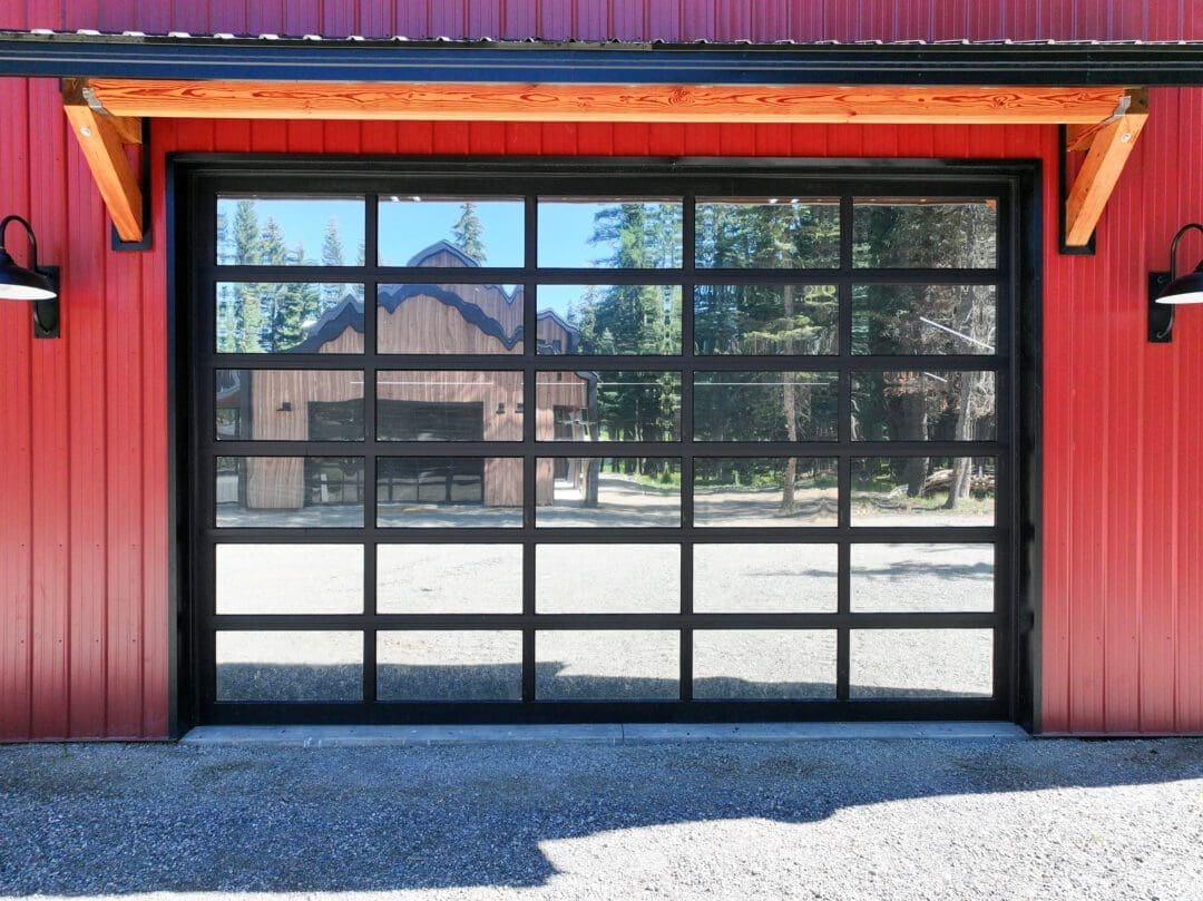 Overhead door with canopy on custom post-frame building in Colville, WA