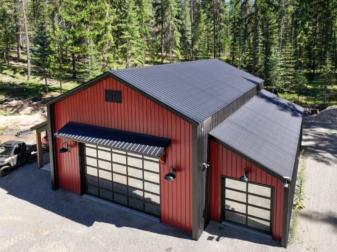 Side view of 32×48×18 post-frame shop with dual lean-tos