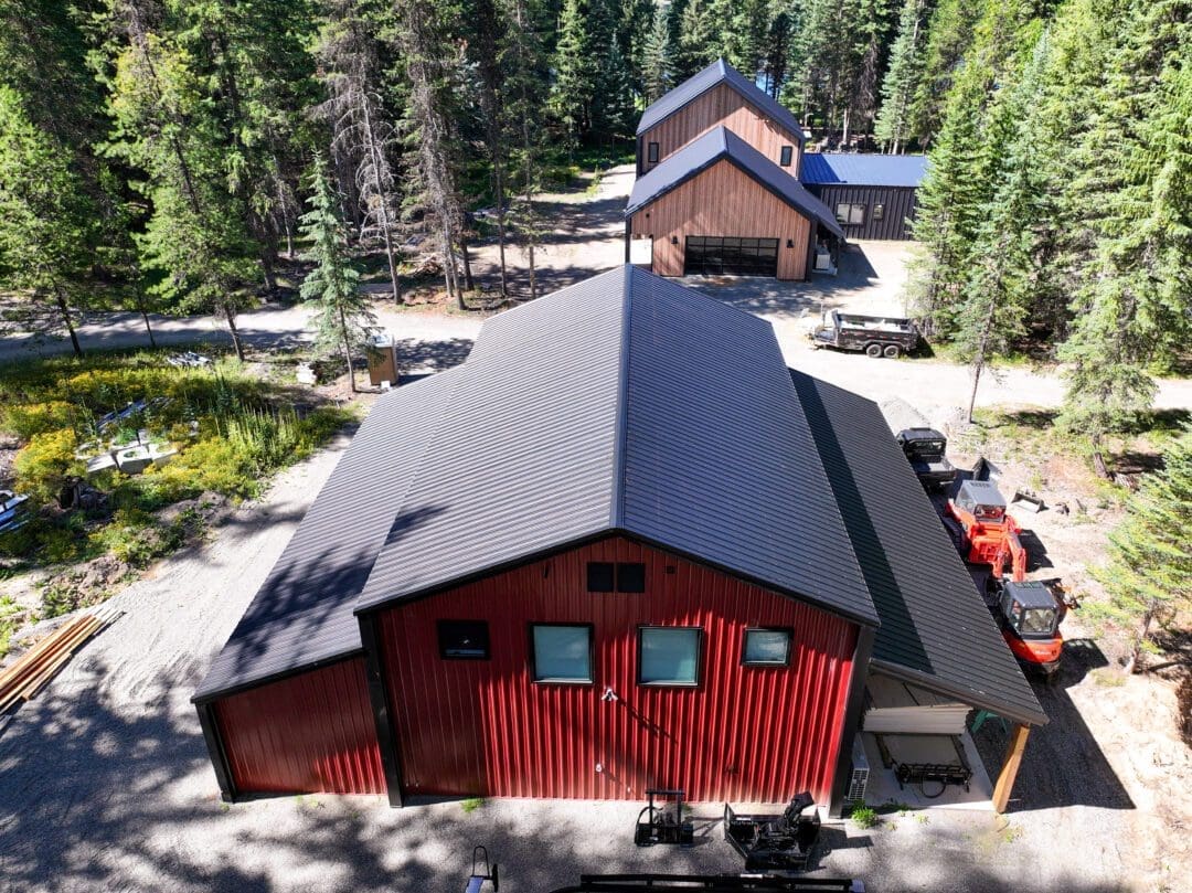 Wide view of 32×48 post-frame shop with covered lean-to space