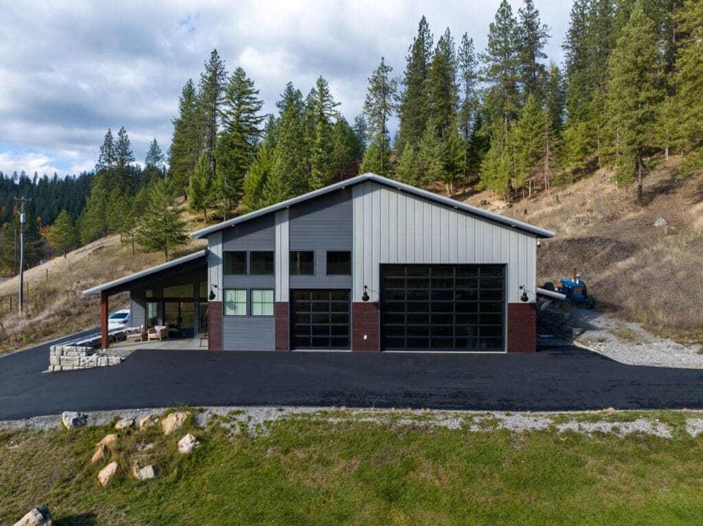 In Episode 3 of our North Idaho Barndominium Tour, we reveal a 52x60 custom steel shop designed for more than storage. With a full kitchen, game loft, and heated tile floors, this space blends functionality and lifestyle perfectly.