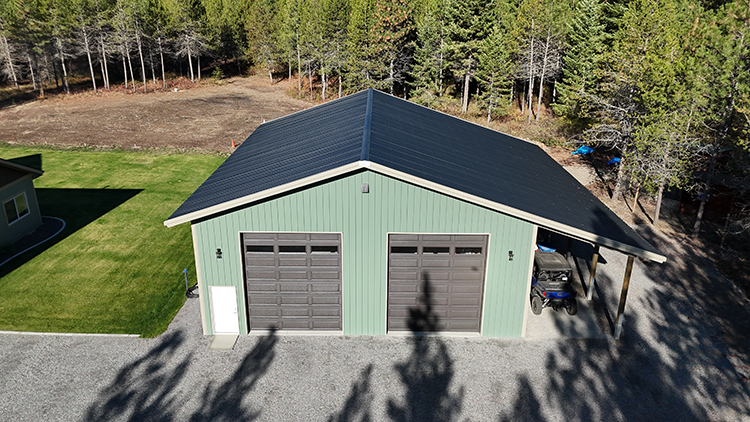 A 40x50 green metal building using post-frame construction