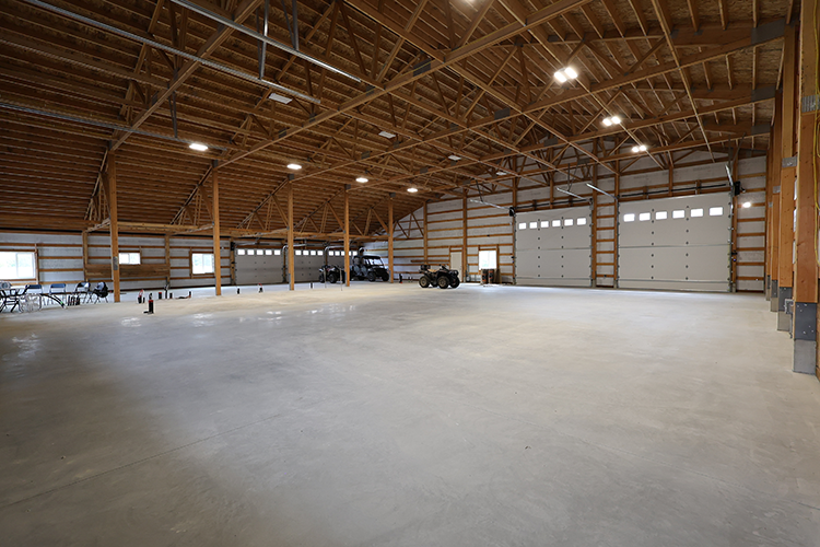 A large shop interior has a lot of specialty lighting to keep things bright