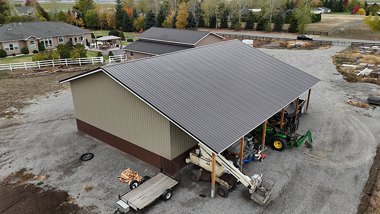 The addition of a lean-to on a metal building adds more space for less cost as shown on this building by Steel Structures America