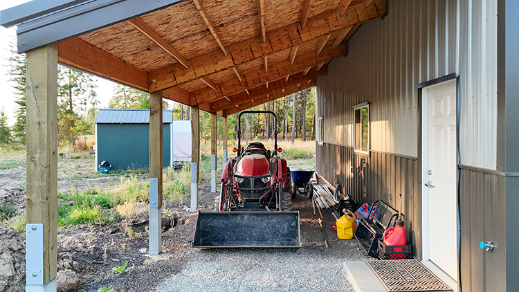 A lean-to adds extra storage space on the side of a pole barn