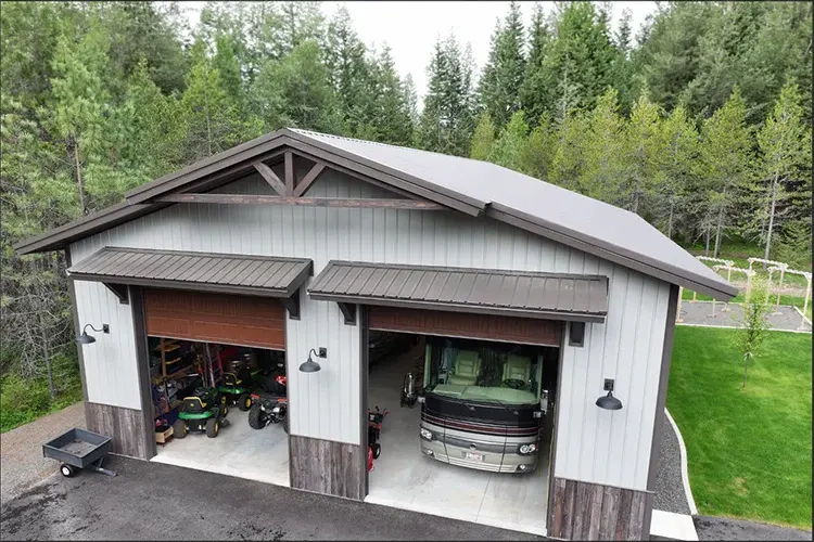 A shop has its large overhead doors open
