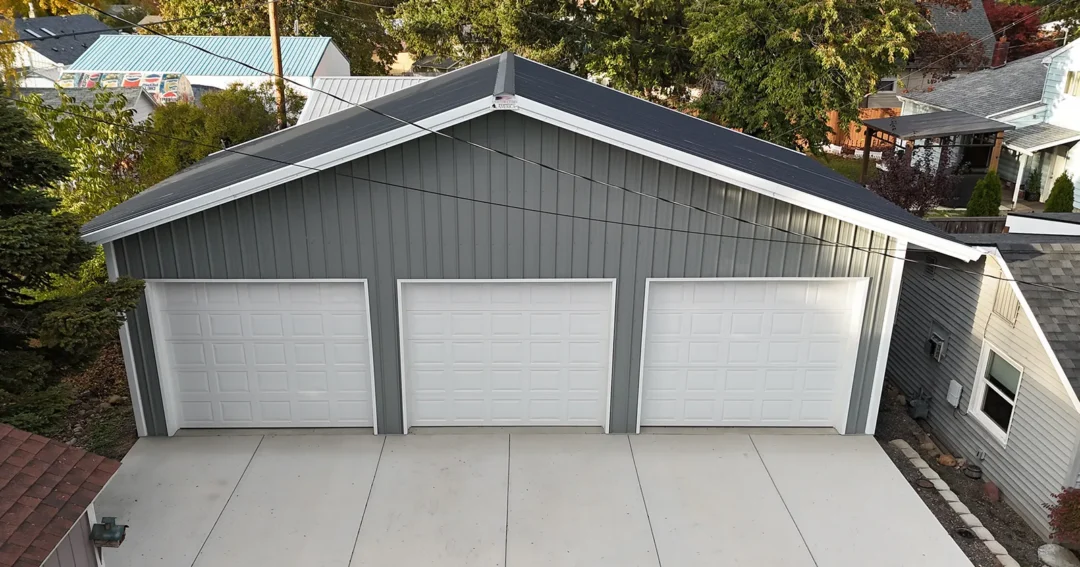 The cost of a metal building can very based on size. The displayed garage is small and grey and on the lower end of the pricing scale