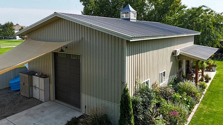 A metal building with a ventilation cap 