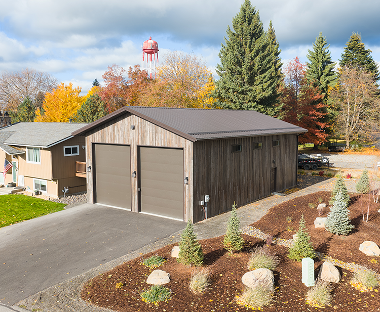 A metal workshop build with post frame construction