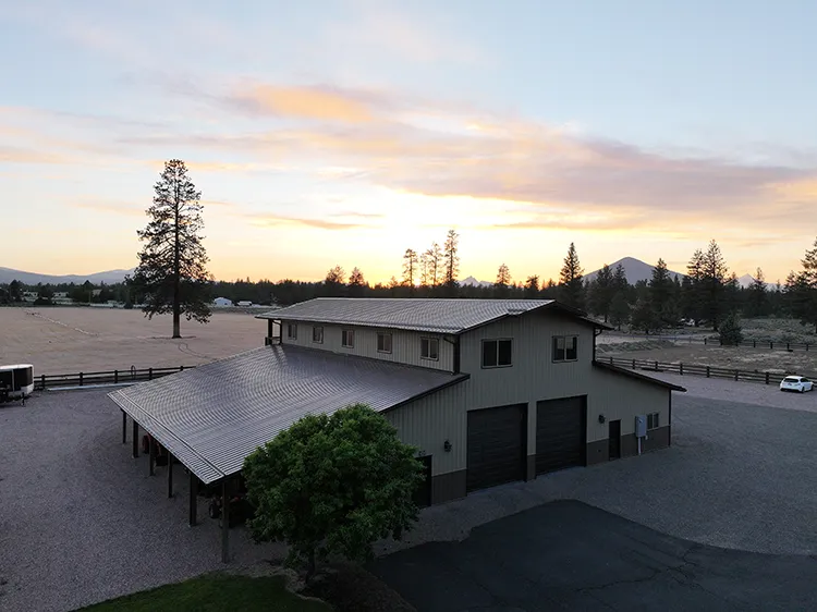 A two story agricultural barn building with hay storage
