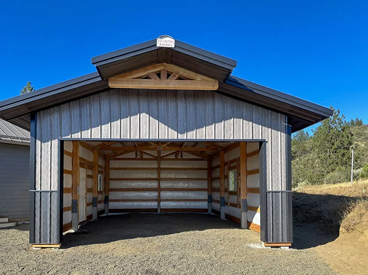 A pole barn with perma column posts and a gravel floor
