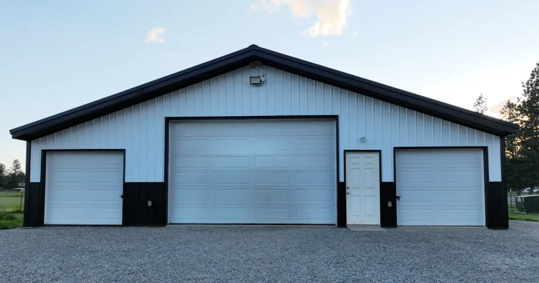 A large custom 3 door white shop that is better for this owner that a pre-engineered building