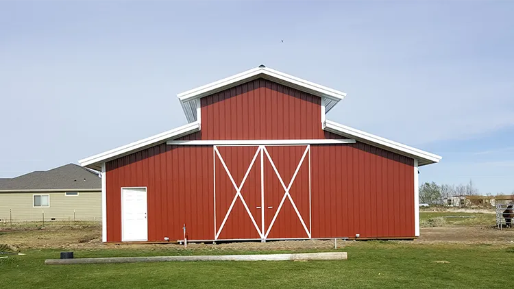 A red barn with classic sliding barn doors