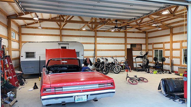 An organized shop interior with sections for different activities and uses
