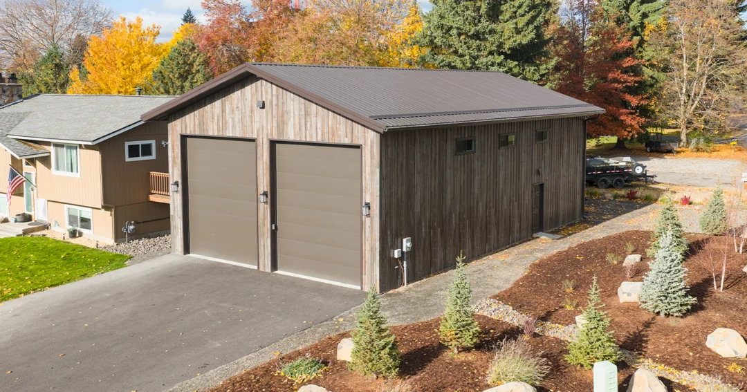 A large post frame building is used as a shop and workshop