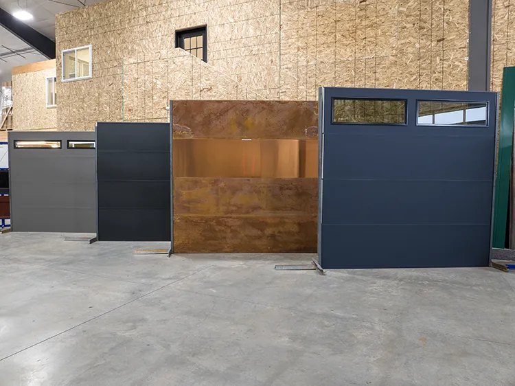 A selection of custom garage doors lined up, from Garage Door Design