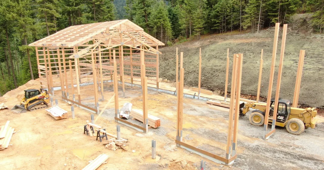 Site prep for a pole barn, showing heavy equipment moving soil